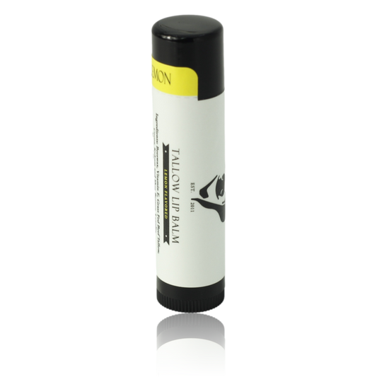 Lip balm with black and yellow packaging on a white background